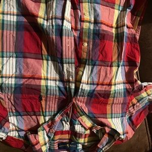 Multicolored hard to find polo shirt.